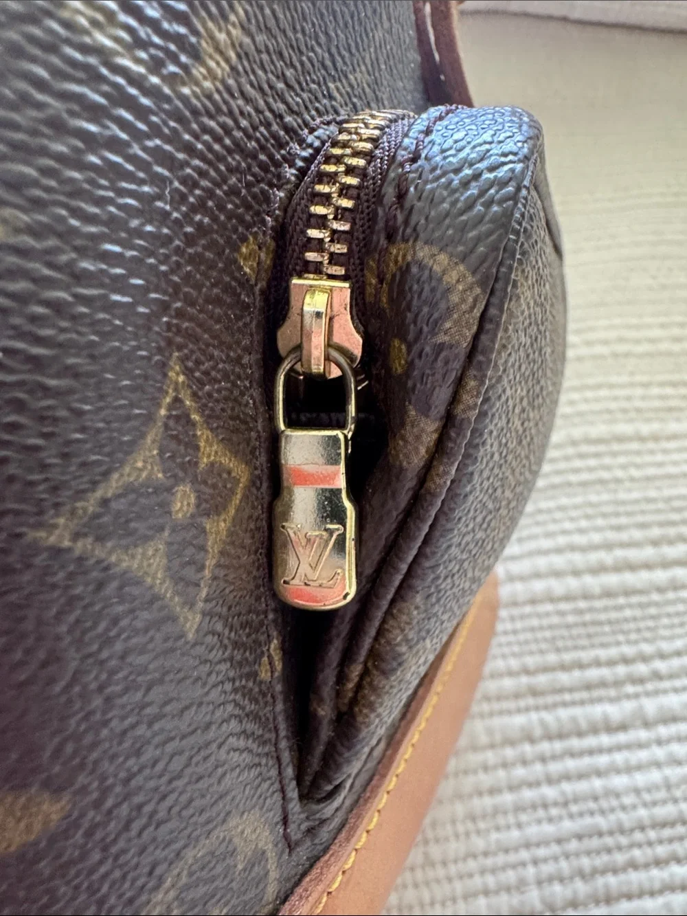 Louis Vuitton Monogram Drawstring Mini Backpack in Brown and Tan Leather Trim